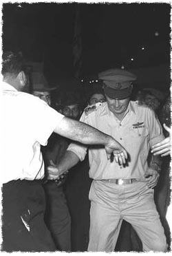 First encounter with Chabad: Israel Defence Force (IDF) chief of staff, Yitzhak Rabin, dances with Chabadniks at a Simchat Torah celebration. Photo: Milner Moshe/Israeli National Photo Library